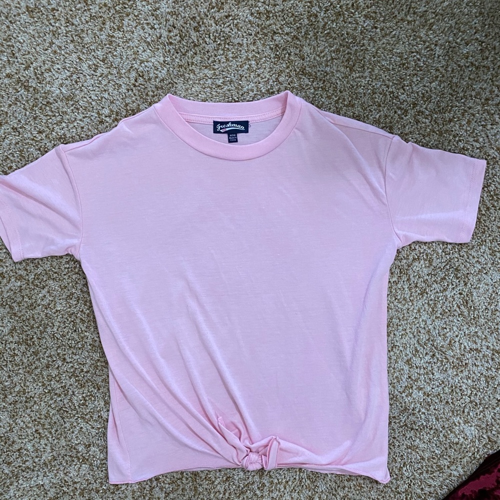 Pink top by freshman